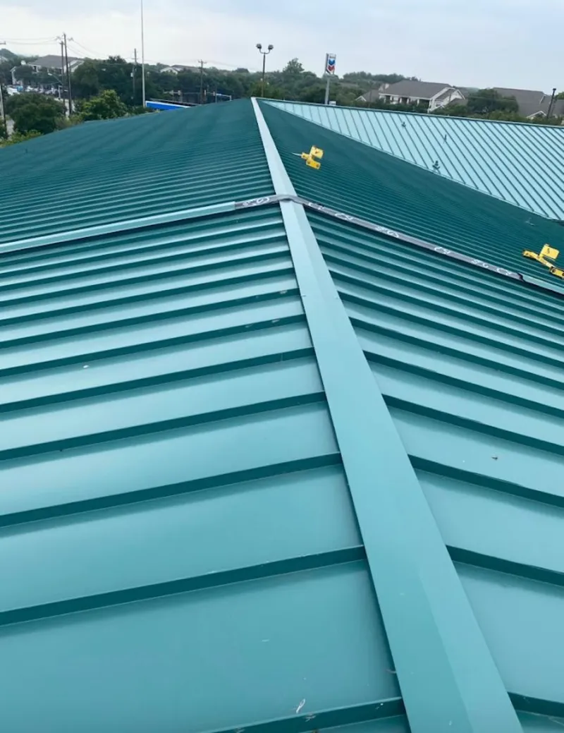 Green commercial metal roof ridge and valley for Metal Roof Repair in Manteno