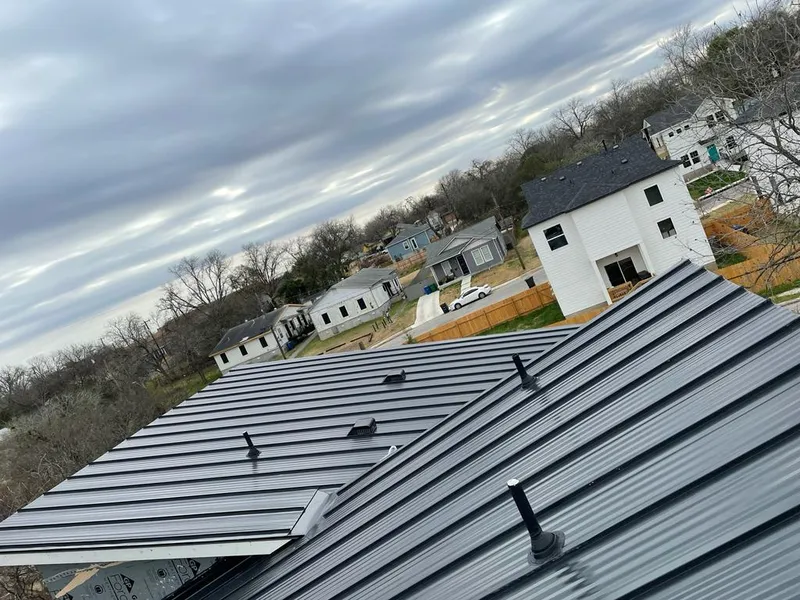 Standing seam metal roof panels with vents for Skylight Repair in Manteno